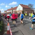 Runners head off up the road, The Black Dog Festival of Running, Bungay, Suffolk - 2nd April 2017