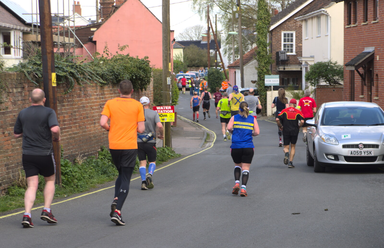 A bunch of half-marathon runners passes by from A Postcard from Beccles, Suffolk - 2nd April 2017