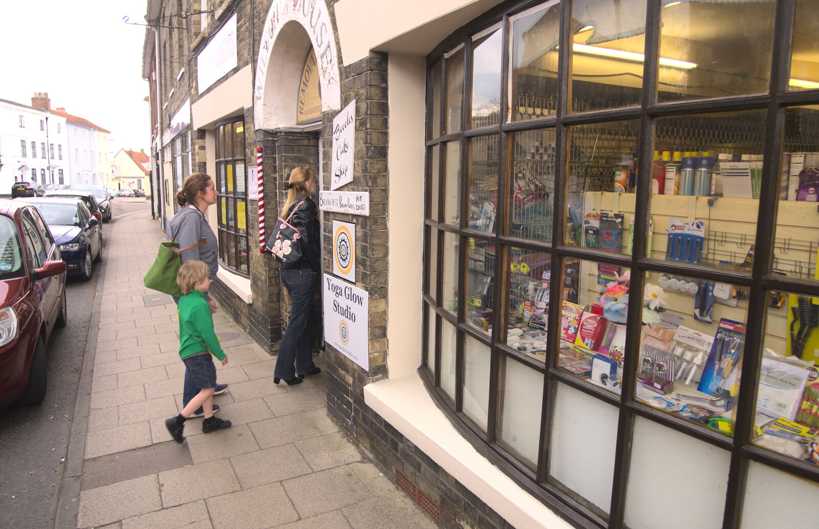 Isobel and Harry head into a closed shop from A Postcard from Beccles, Suffolk - 2nd April 2017