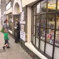 Isobel and Harry head into a closed shop, A Postcard from Beccles, Suffolk - 2nd April 2017