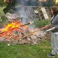 Isobel fishes out a baked potato from the fire, A Postcard from Beccles, Suffolk - 2nd April 2017