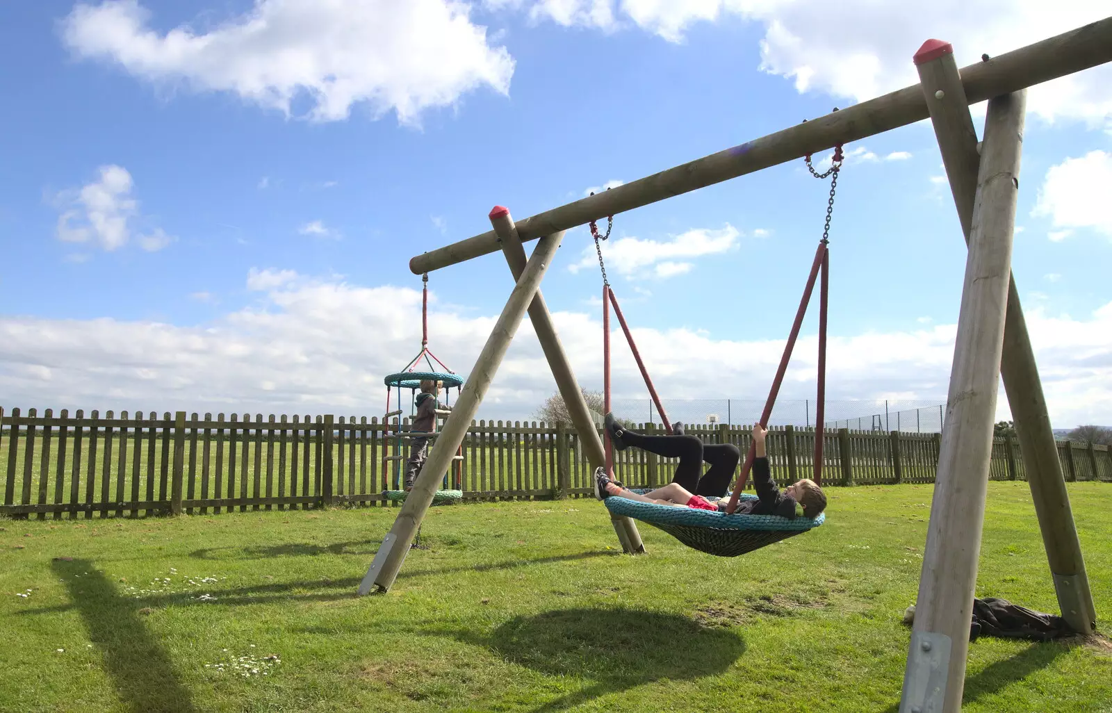 On the swings, from Grandma J's and a Day on the Beach, Spreyton and Exmouth, Devon - 13th April 2017