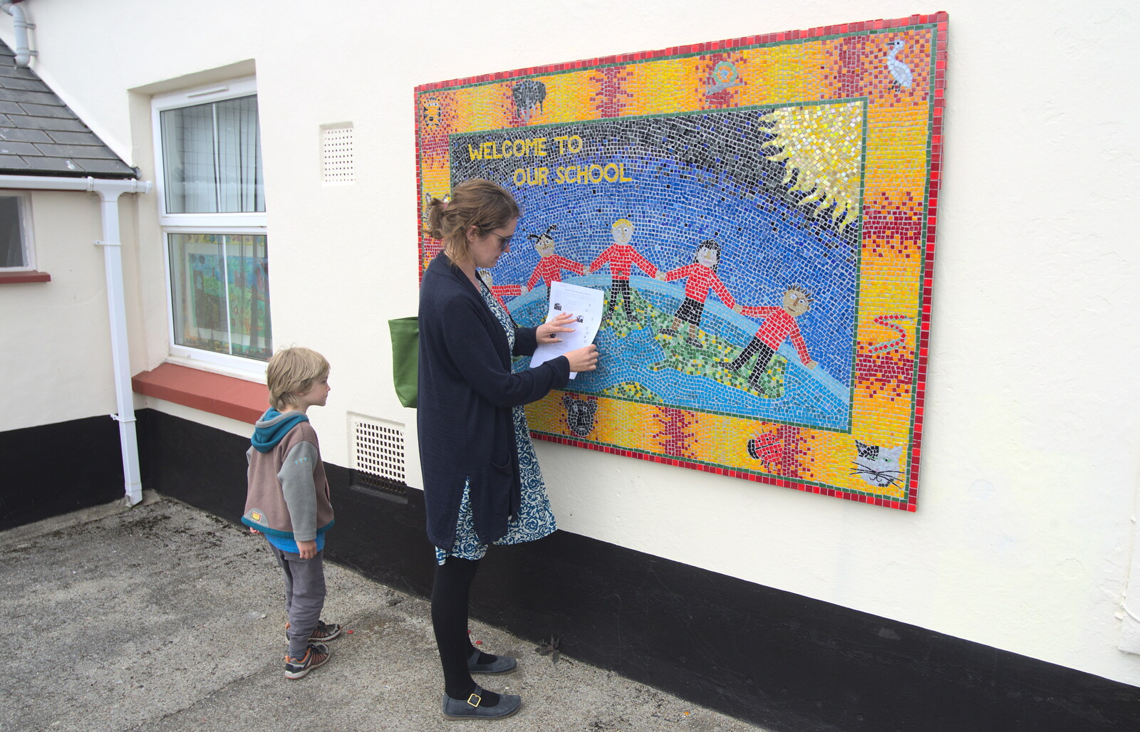 Isobel by the school's mosaic from Grandma J's and a Day on the Beach, Spreyton and Exmouth, Devon - 13th April 2017