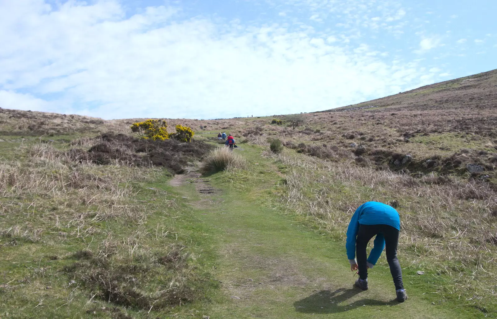 Isobel ties a boot lace, from A Barbeque, Grimspound and Pizza, Dartmoor and Exeter, Devon - 15th April 2017