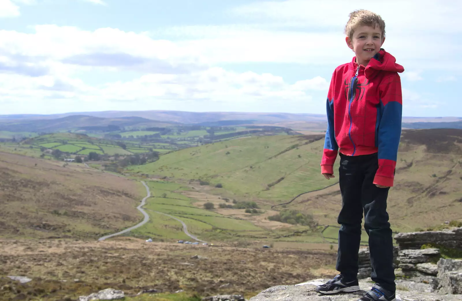 Fred stands at the top of the tor, from A Barbeque, Grimspound and Pizza, Dartmoor and Exeter, Devon - 15th April 2017