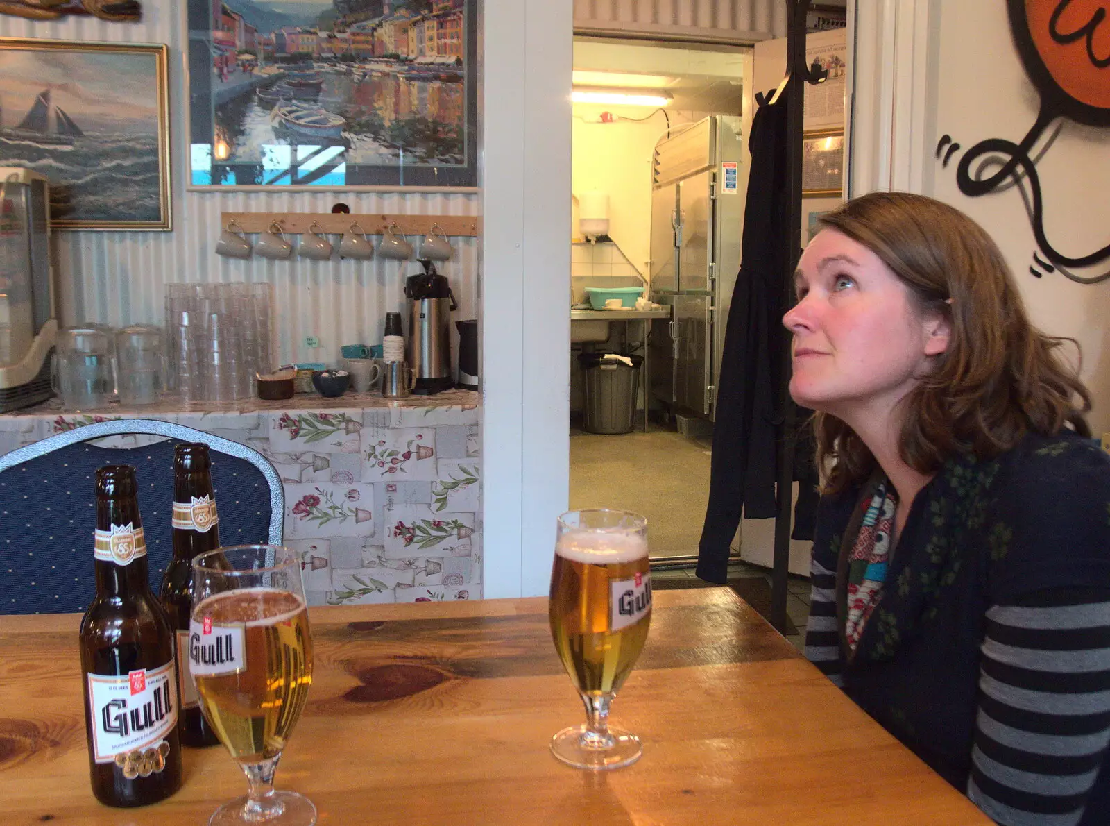 Isobel looks up over her beer, from Stríðsminjar War Relics, Perlan and Street Art, Reykjavik, Iceland - 23rd April 2017