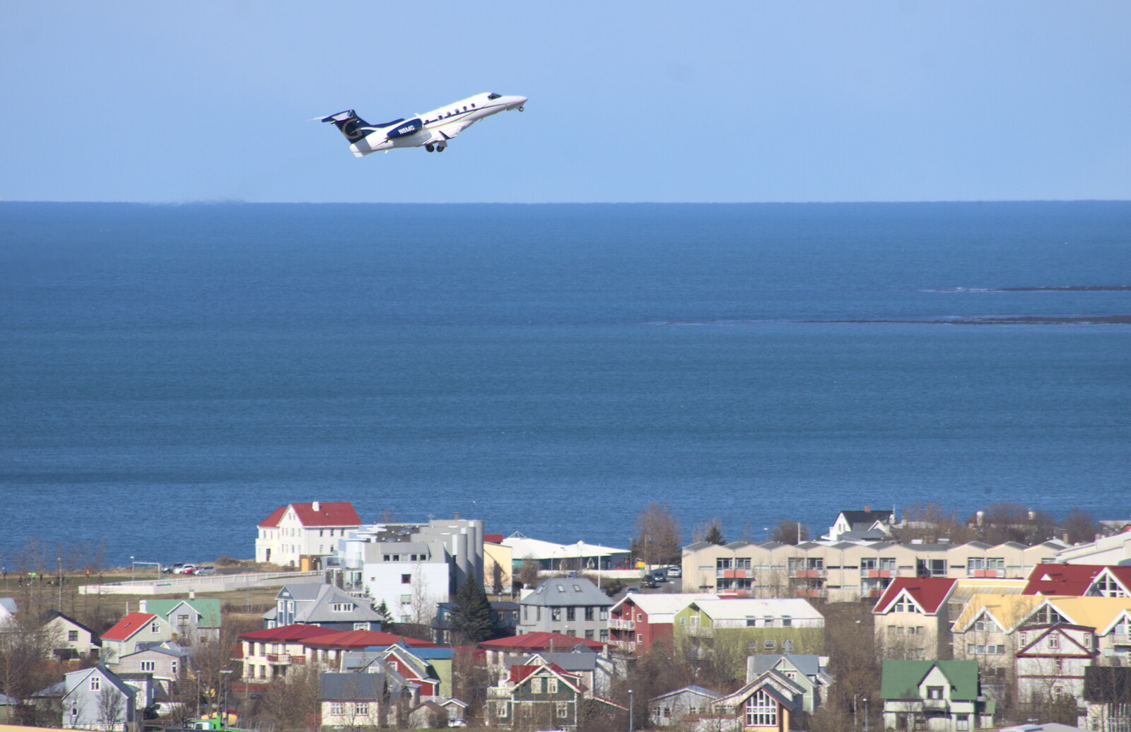 A small executive jet takes off from the airport from Stríðsminjar War Relics, Perlan and Street Art, Reykjavik, Iceland - 23rd April 2017