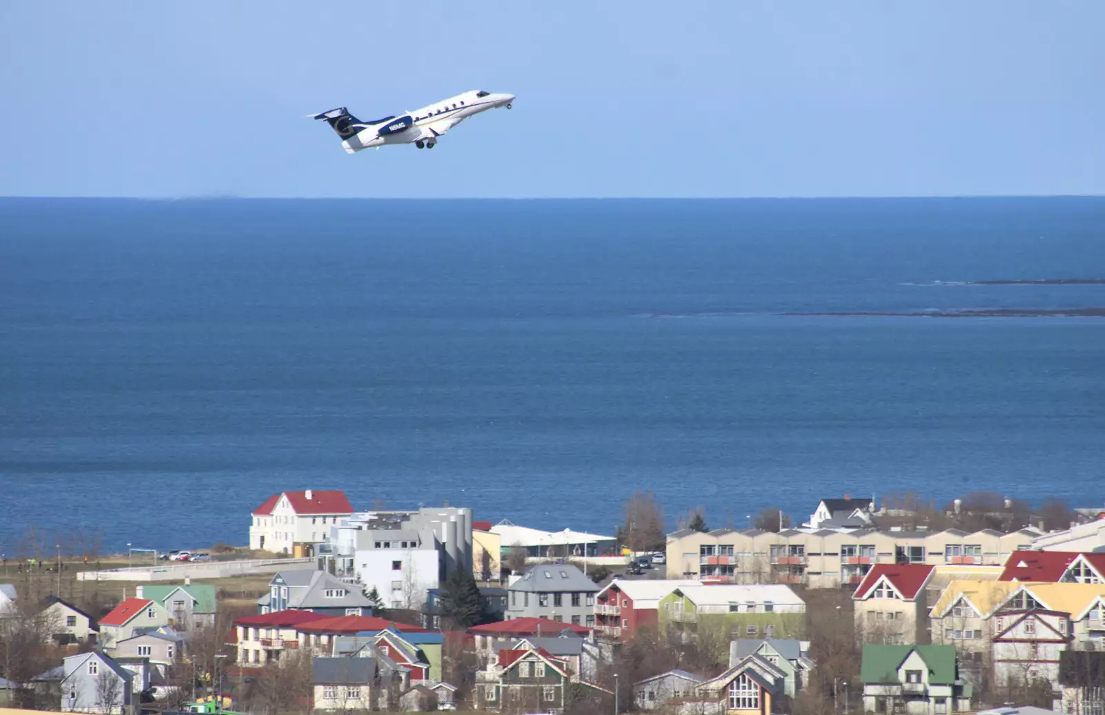 A small executive jet takes off from the airport, from Stríðsminjar War Relics, Perlan and Street Art, Reykjavik, Iceland - 23rd April 2017