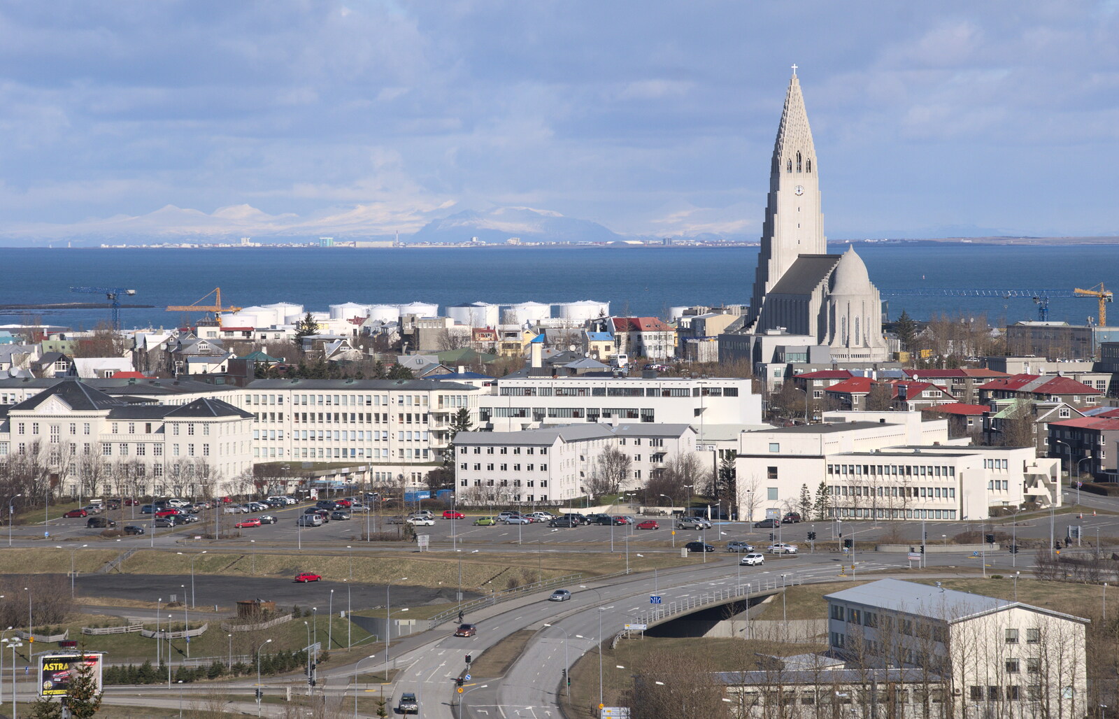 Hallgrímskirkja dominates the skyline of the city from Stríðsminjar War Relics, Perlan and Street Art, Reykjavik, Iceland - 23rd April 2017