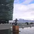 A cellist statue outside Harpa, Stríðsminjar War Relics, Perlan and Street Art, Reykjavik, Iceland - 23rd April 2017