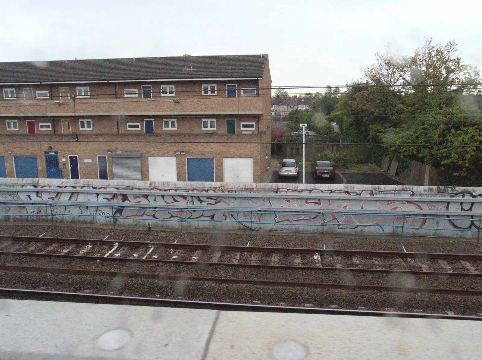 Graffiti by the tracks, from The Journey Home, Reykjavik, London and Brantham - 24th April 2017