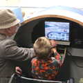 Fred tries a flight simulator, and actually lands, Norfolk and Suffolk Aviation Museum, Flixton, Suffolk - 30th April 2017