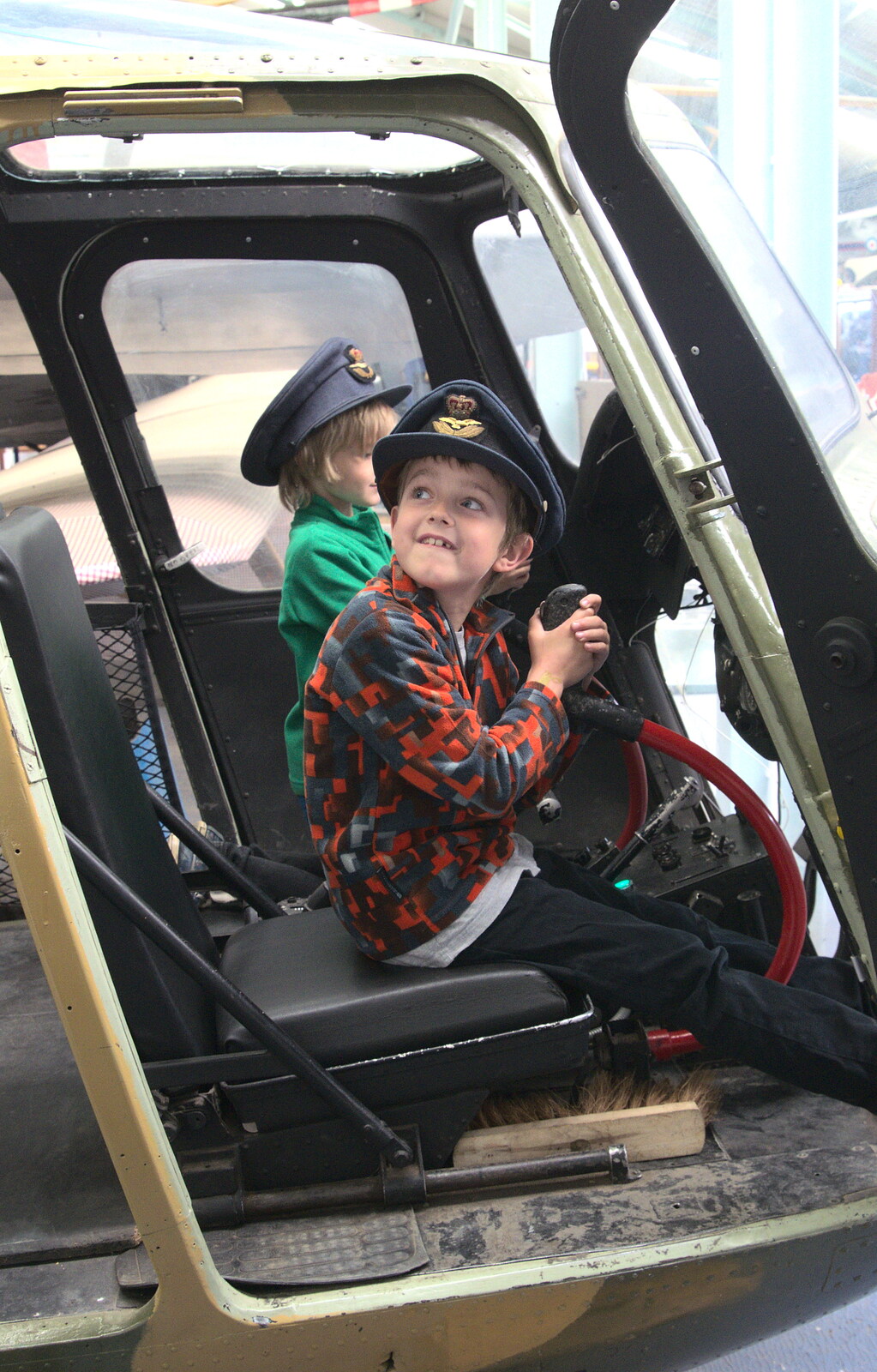 Fred and Harry pretend to fly a Sycamore helicopter from Norfolk and Suffolk Aviation Museum, Flixton, Suffolk - 30th April 2017