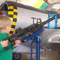 Harry plays with a 0.50-cal Browning machine gun, Norfolk and Suffolk Aviation Museum, Flixton, Suffolk - 30th April 2017