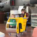 Fred pushes Harry around in a helicopter, Norfolk and Suffolk Aviation Museum, Flixton, Suffolk - 30th April 2017