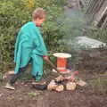 Fred pokes a fire with a stick, Campfires, Oaksmere Building and a BSCC Bike Ride, Brome, Suffolk - 4th May 2017