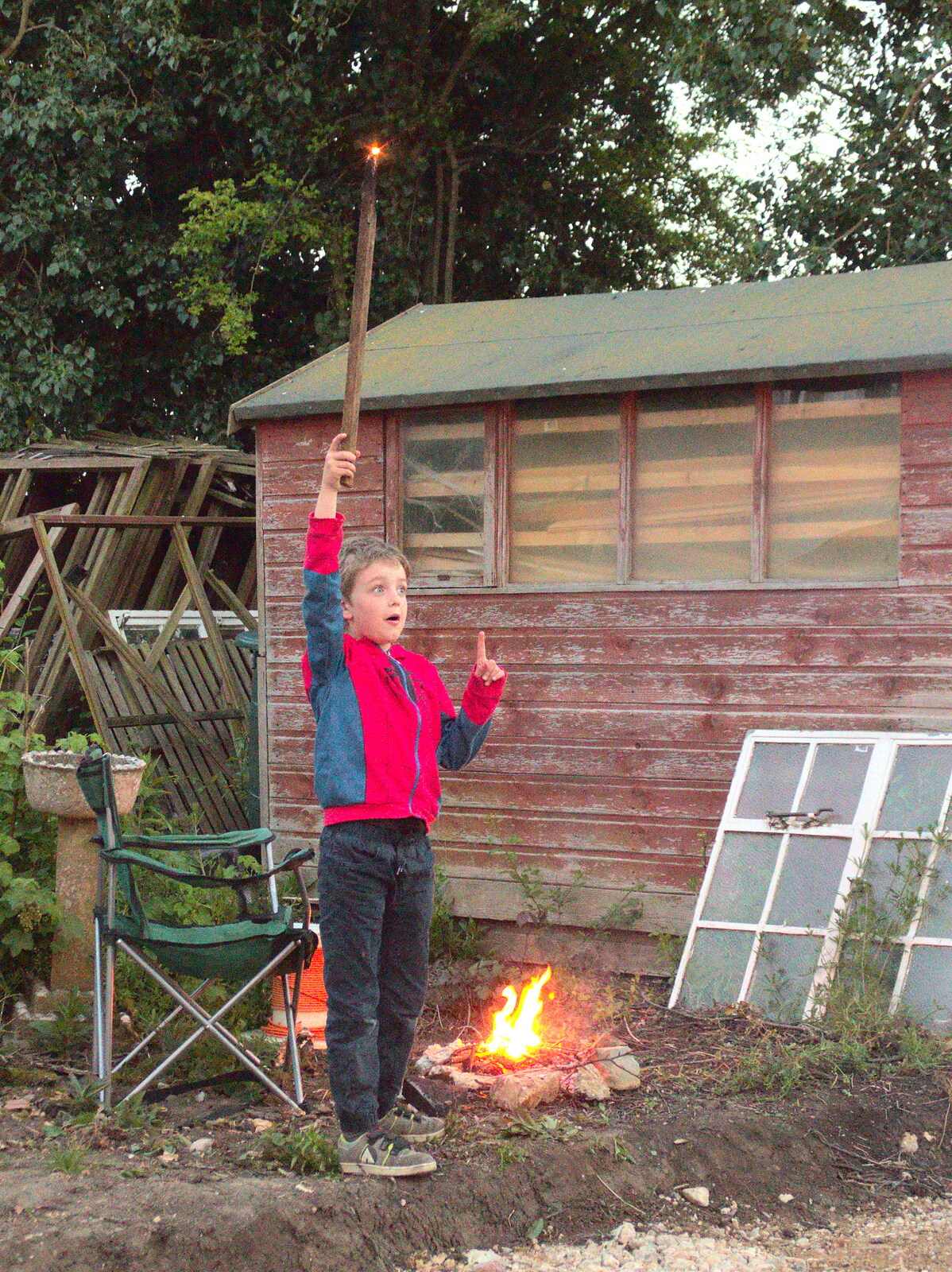 Fred waves a burning stick in the air from Campfires, Oaksmere Building and a BSCC Bike Ride, Brome, Suffolk - 4th May 2017