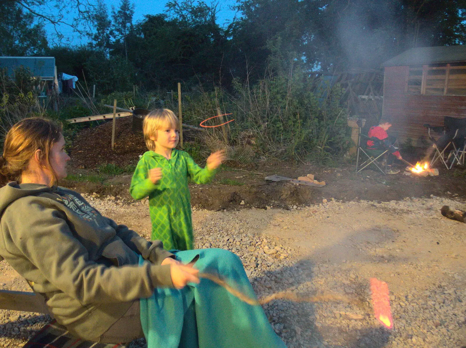 Harry waves a burning stick around, from Campfires, Oaksmere Building and a BSCC Bike Ride, Brome, Suffolk - 4th May 2017