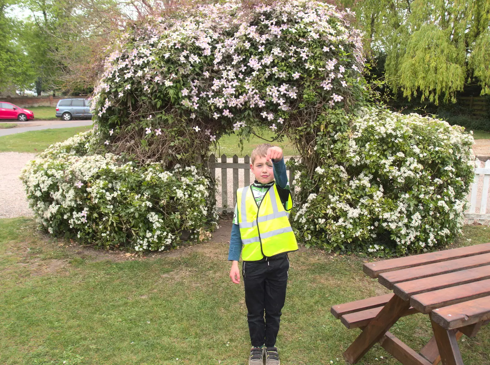 Fred holds up a leaf in the Cock's beer garden, from The Last-Ever BSCC Weekend Away Bike Ride, Thaxted, Essex - 6th May 2017