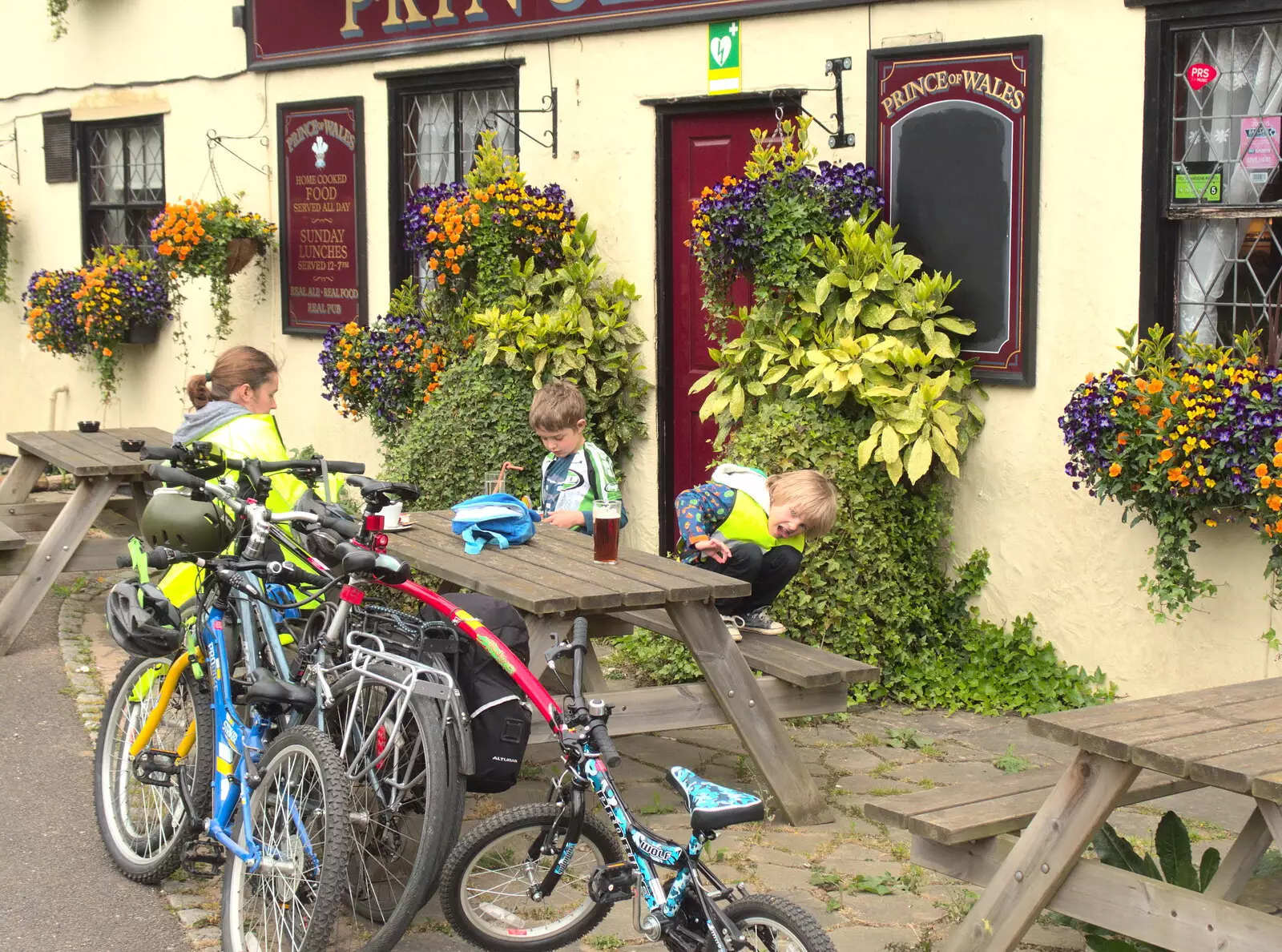 Harry climbs around over the bench, from The Last-Ever BSCC Weekend Away Bike Ride, Thaxted, Essex - 6th May 2017