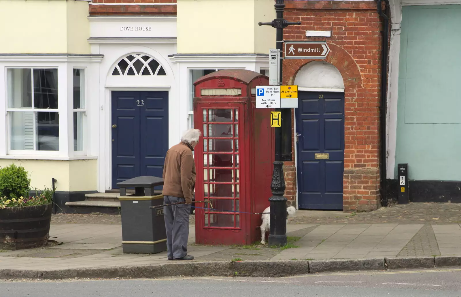 A dog has a wee on a K6 phone box, from A Postcard From Thaxted, Essex - 7th May 2017