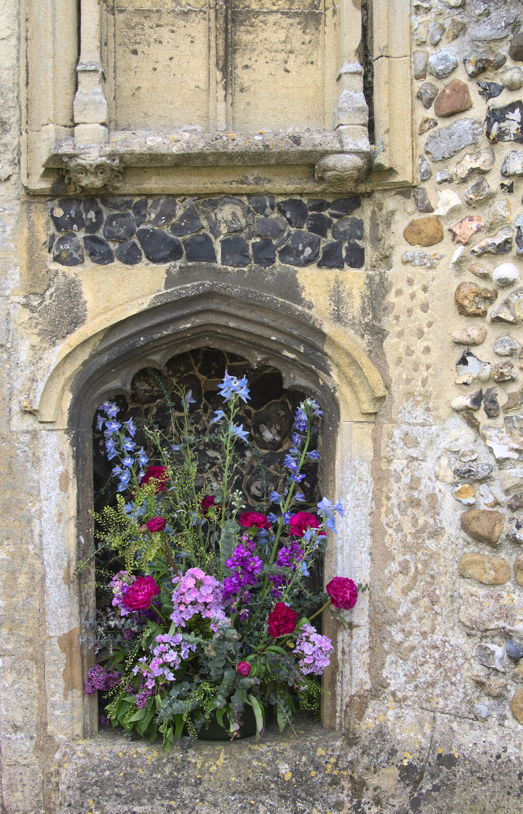 Nice flowers by the church entrance from A Postcard From Thaxted, Essex - 7th May 2017
