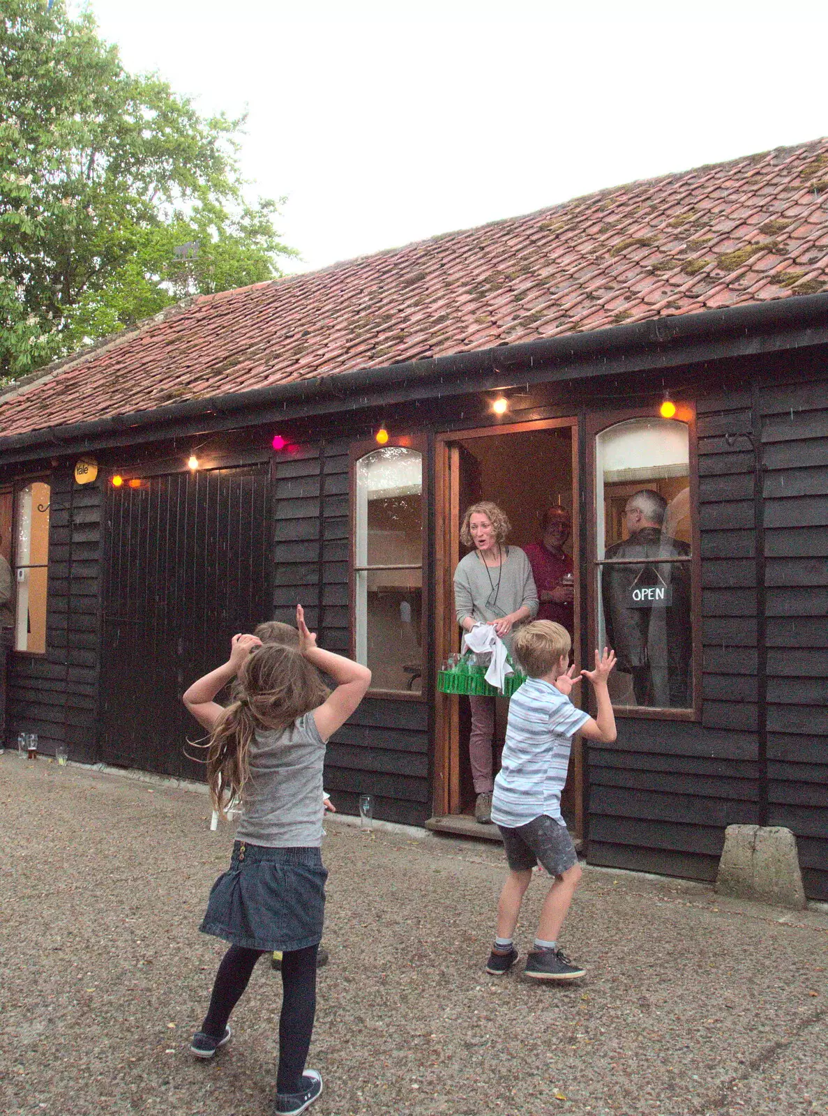 Children play in the rain, from A Day at the Grain Brewery Open Day, Alburgh, Suffolk - 20th May 2017