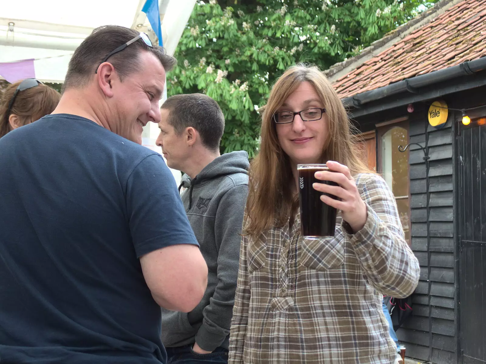 Suey looks at beer, from A Day at the Grain Brewery Open Day, Alburgh, Suffolk - 20th May 2017