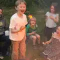 There's excitement as Oak torches his marshmallow , Wavy and Martina's Combined Birthdays, Thrandeston, Suffolk - 27th May 2017