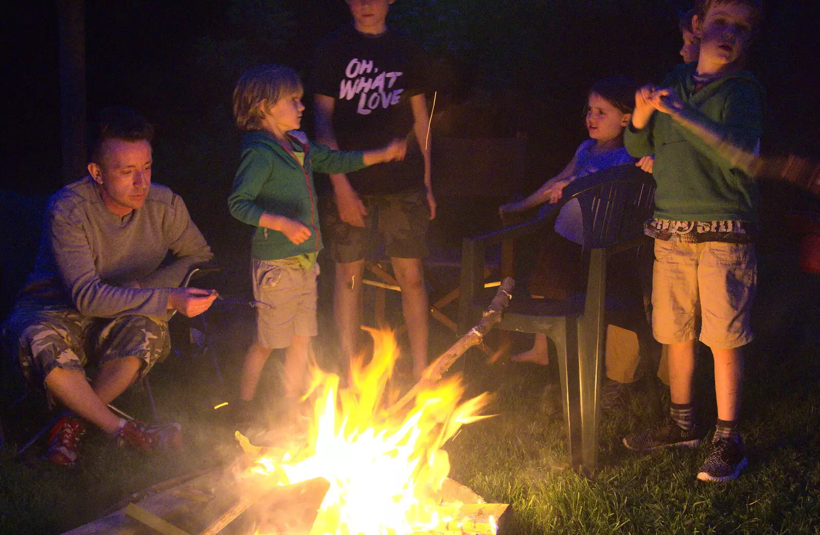 Harry waves a burning stick around, from Wavy and Martina's Combined Birthdays, Thrandeston, Suffolk - 27th May 2017