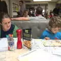 Isobel and Fred scope the menu in Pizza Express, Wavy and Martina's Combined Birthdays, Thrandeston, Suffolk - 27th May 2017