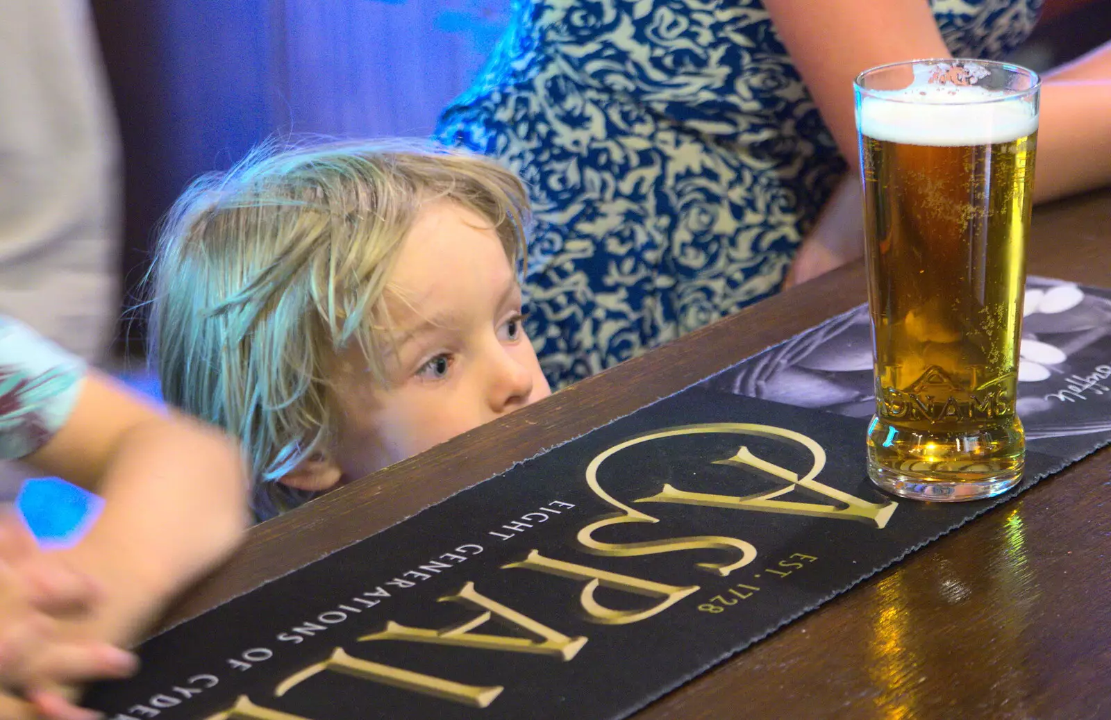 Harry peeps over the bar, from A Retirement: The Last Night of The Swan Inn, Brome, Suffolk - 3rd June 2017