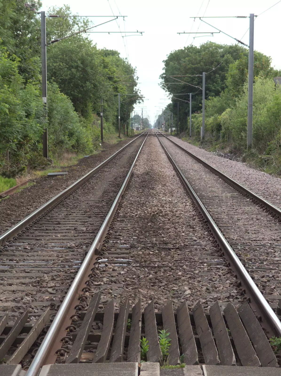 The railway towards London vanishes in the distance, from The BSCC at the Mellis Railway and The Swan, Brome, Suffolk - 8th June 2017