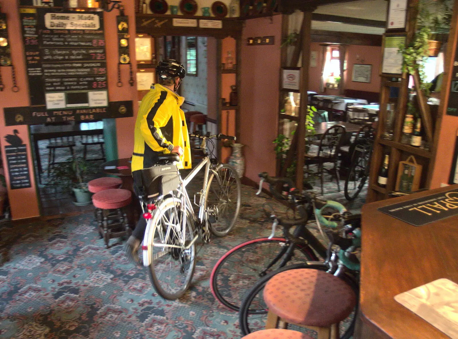 Pippa stashes her bike in the pub, from The BSCC at the Mellis Railway and The Swan, Brome, Suffolk - 8th June 2017