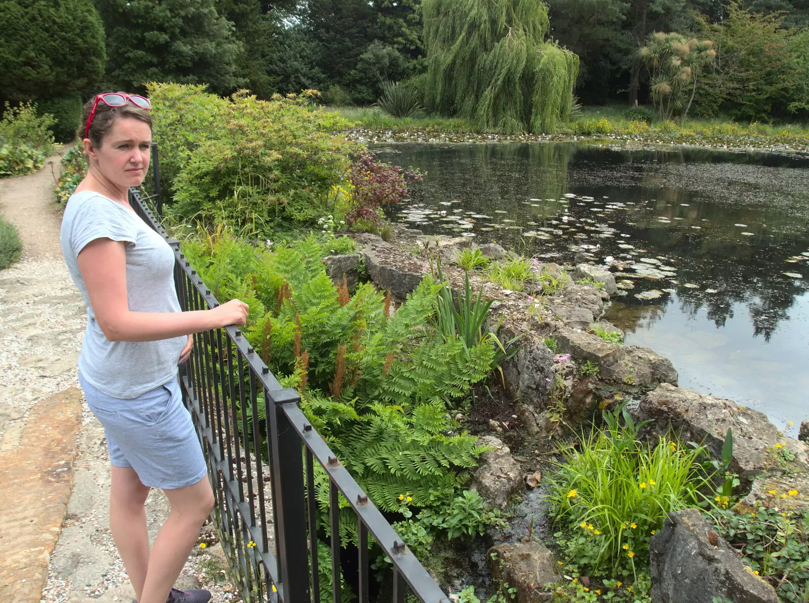 Isobel considers the pond, from Lifehouse and Thorpe Hall Gardens, Thorpe-le-Soken, Essex - 11th June 2017