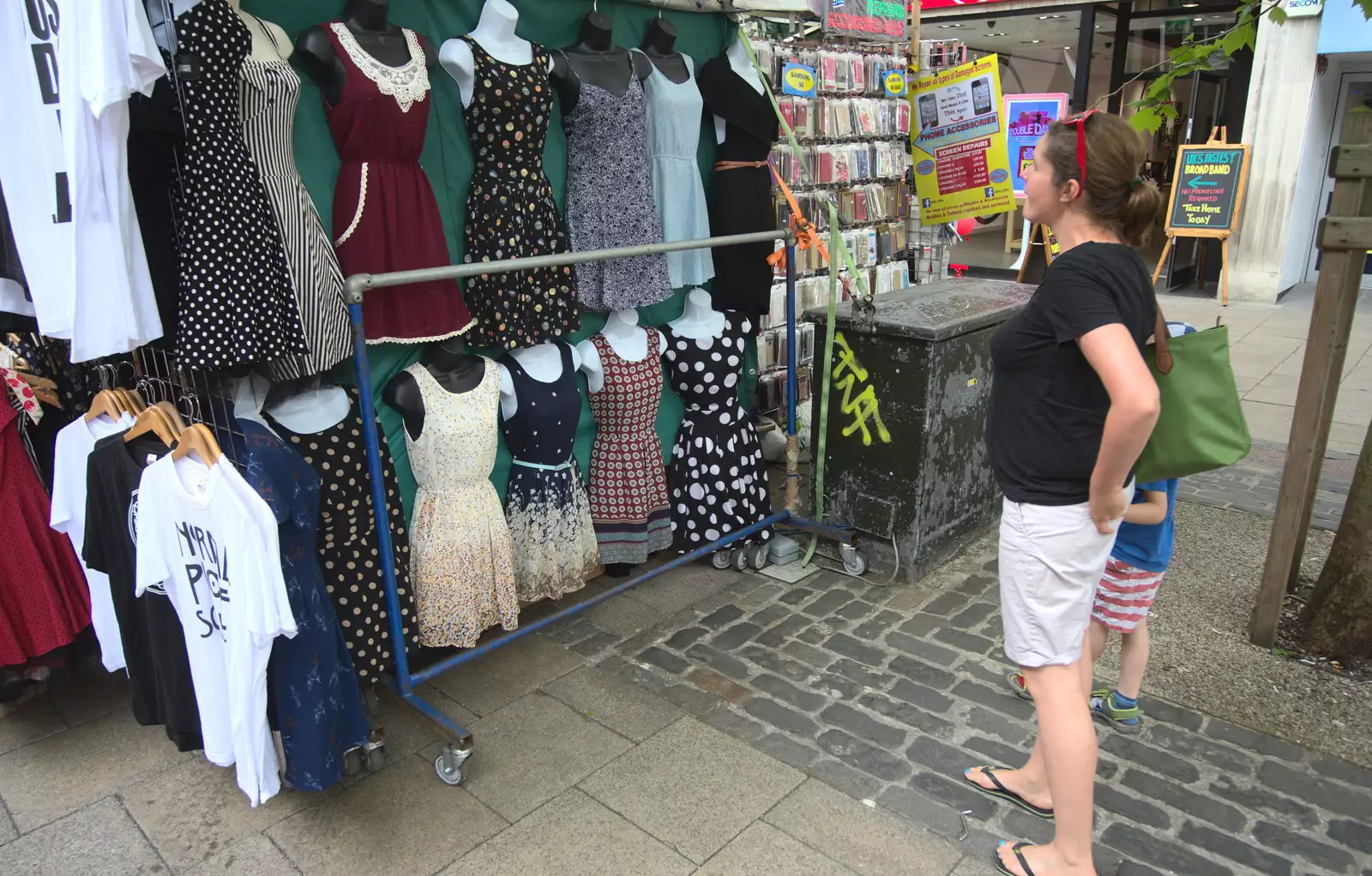 Isobel looks at random dresses, from Isobel's Choral Flash Mob, Norwich, Norfolk - 17th June 2017