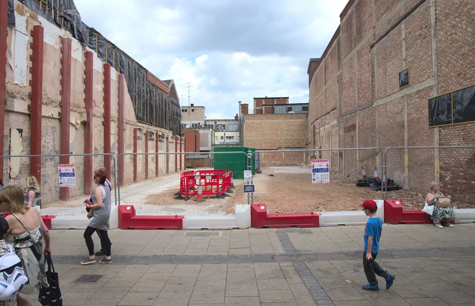 There's a big hole where a building used to be, from Isobel's Choral Flash Mob, Norwich, Norfolk - 17th June 2017