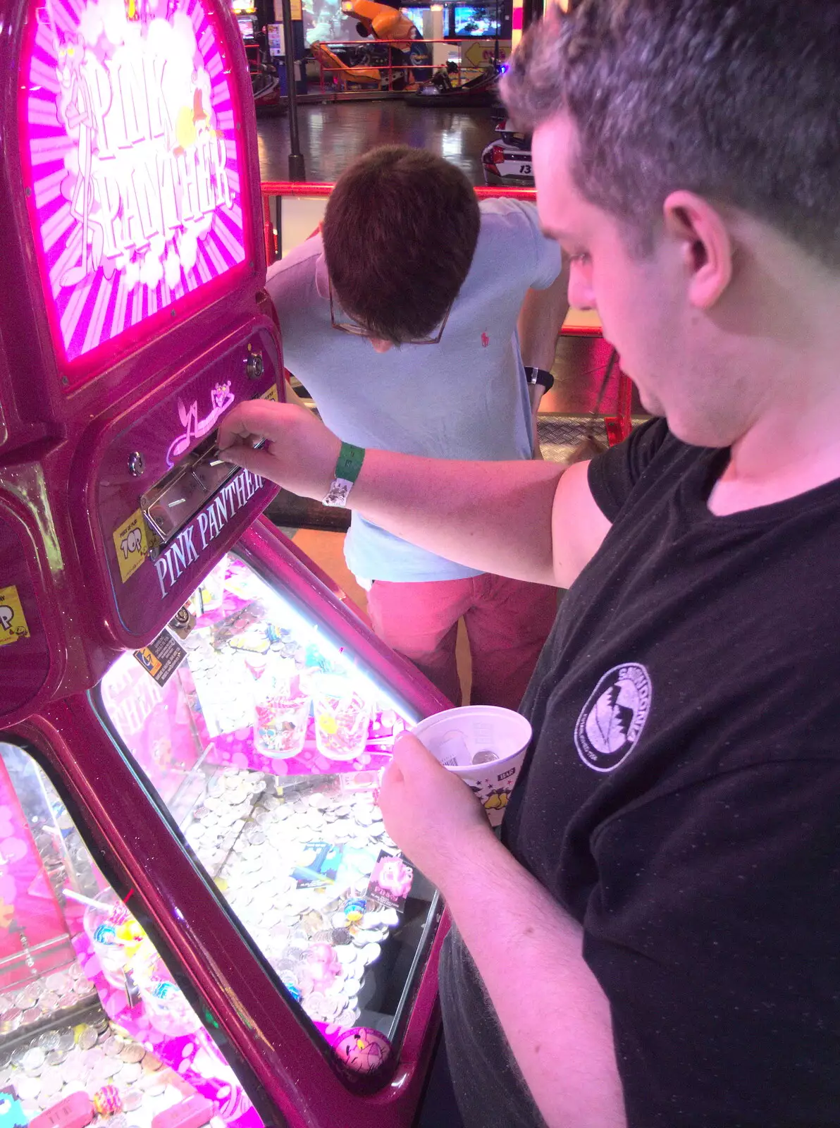 Feeding the coin slots, from SwiftKey does Namco Funscape, Westminster, London - 20th June 2017