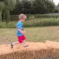 Harry runs around on bales, Thrandeston Pig, Little Green, Thrandeston, Suffolk - 25th June 2017