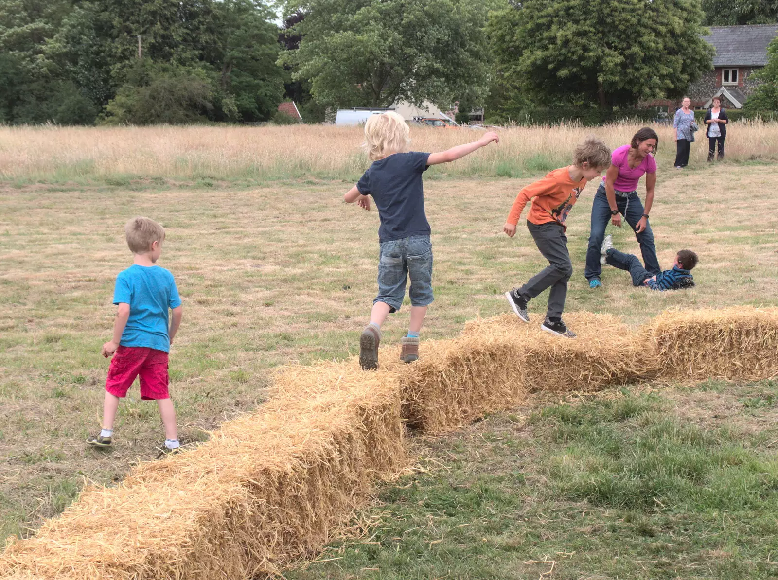 All the children are running on bales, from Thrandeston Pig, Little Green, Thrandeston, Suffolk - 25th June 2017