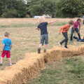 All the children are running on bales, Thrandeston Pig, Little Green, Thrandeston, Suffolk - 25th June 2017