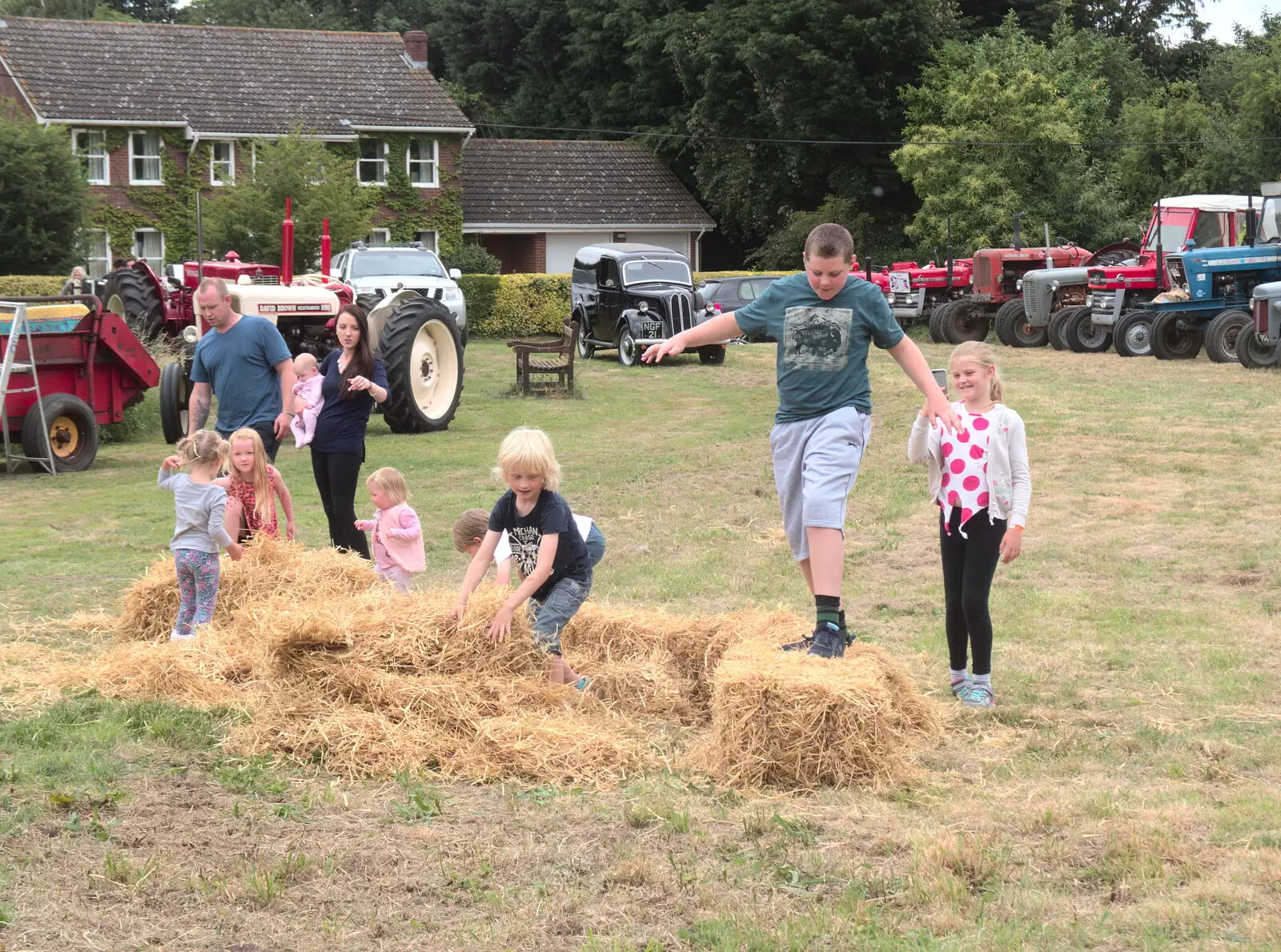 The kids destroy the bales, from Thrandeston Pig, Little Green, Thrandeston, Suffolk - 25th June 2017