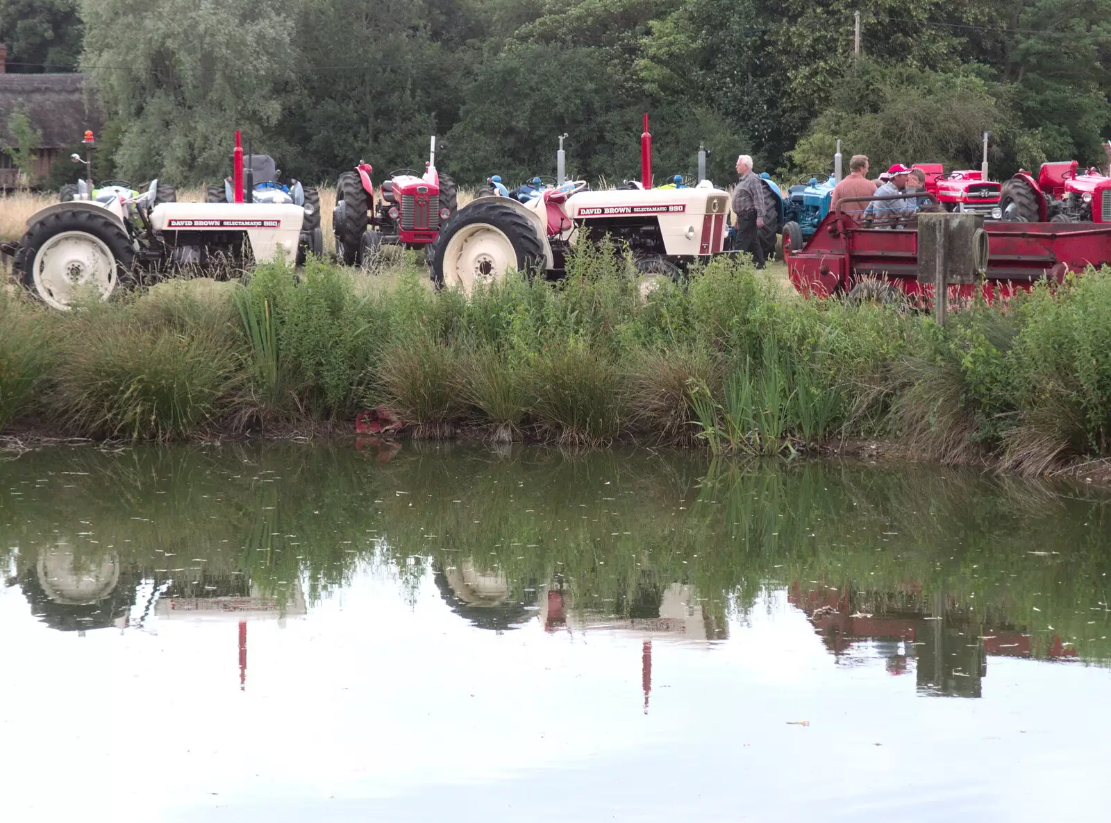 Tractors reflected on the pond, from Thrandeston Pig, Little Green, Thrandeston, Suffolk - 25th June 2017