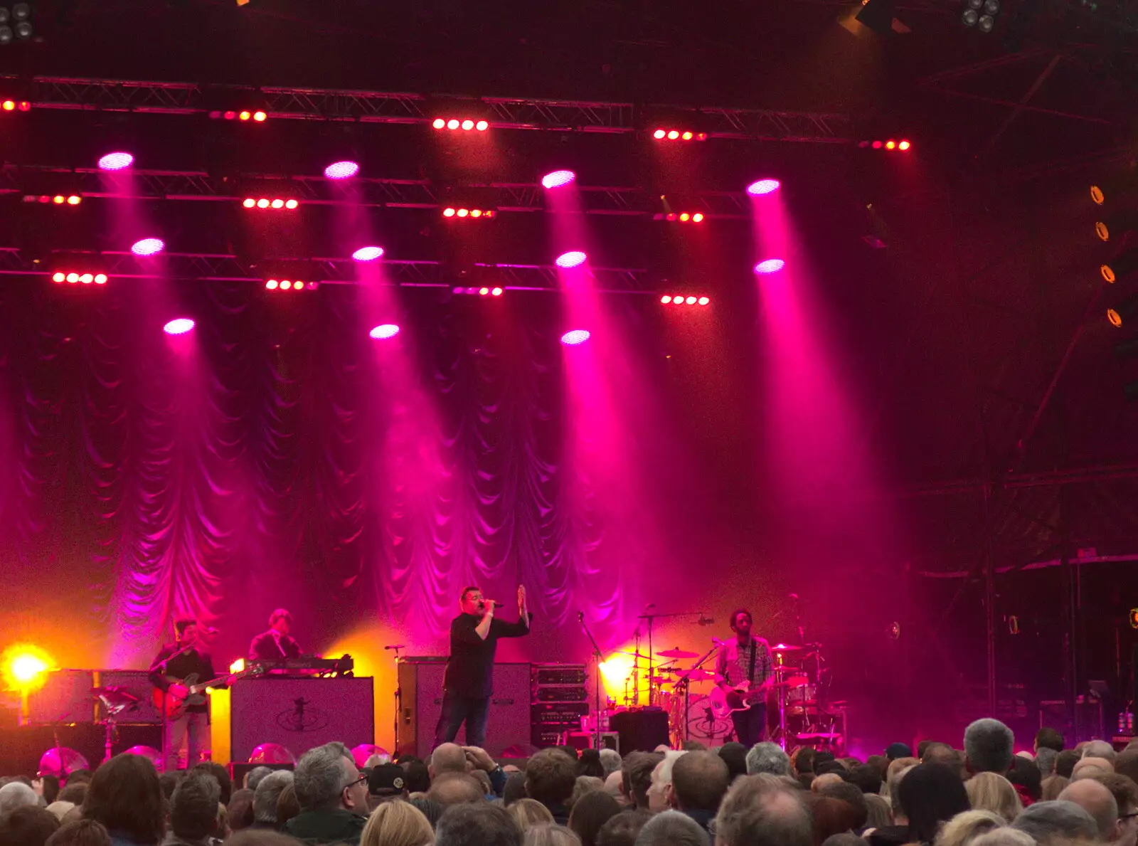 Guy Garvey gives it some under pink light, from Elbow at High Lodge, Brandon, Suffolk - 29th June 2017