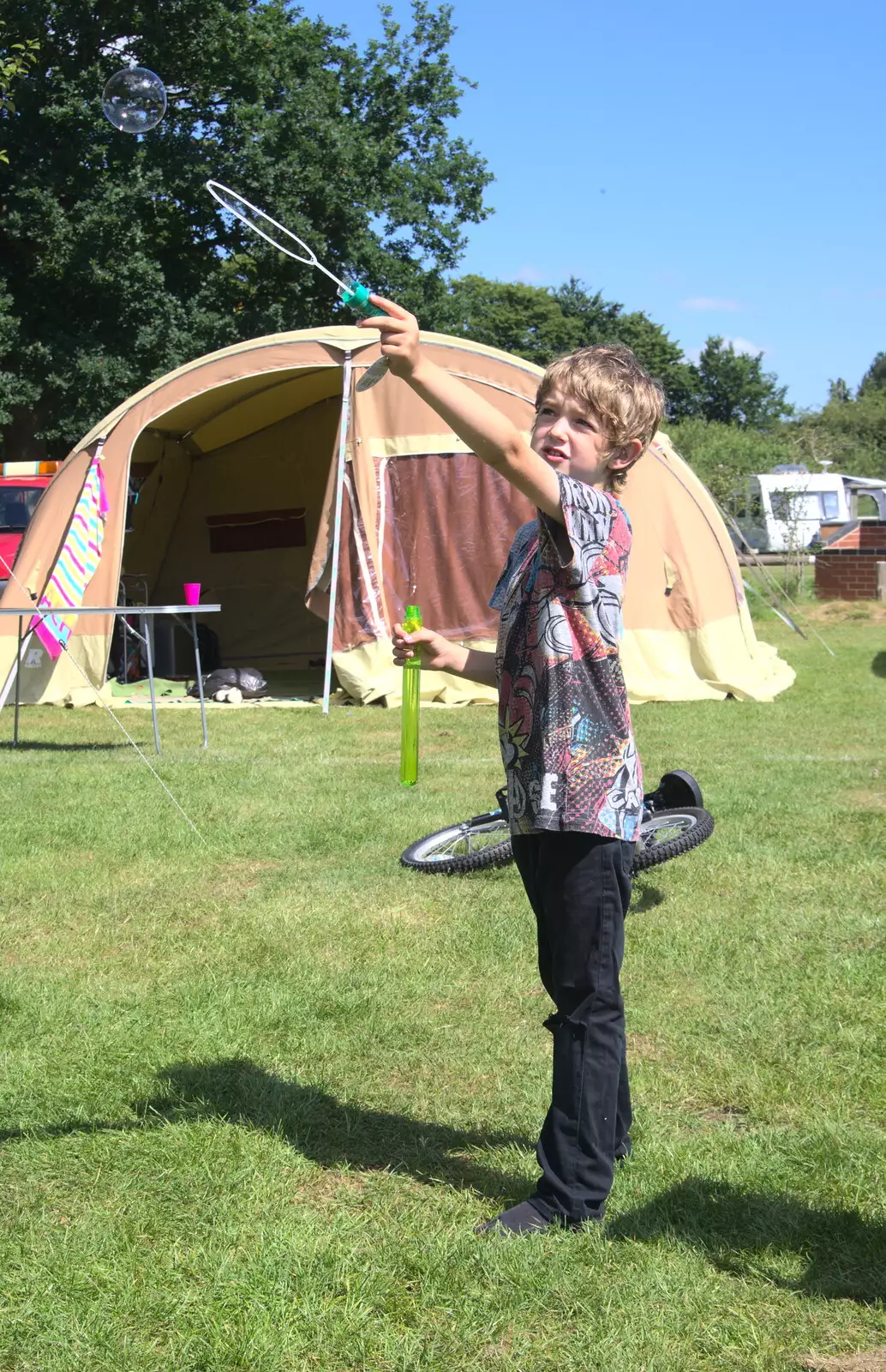 Fred lets a bubble loose, from Camping at Dower House, West Harling, Norfolk - 1st July 2017