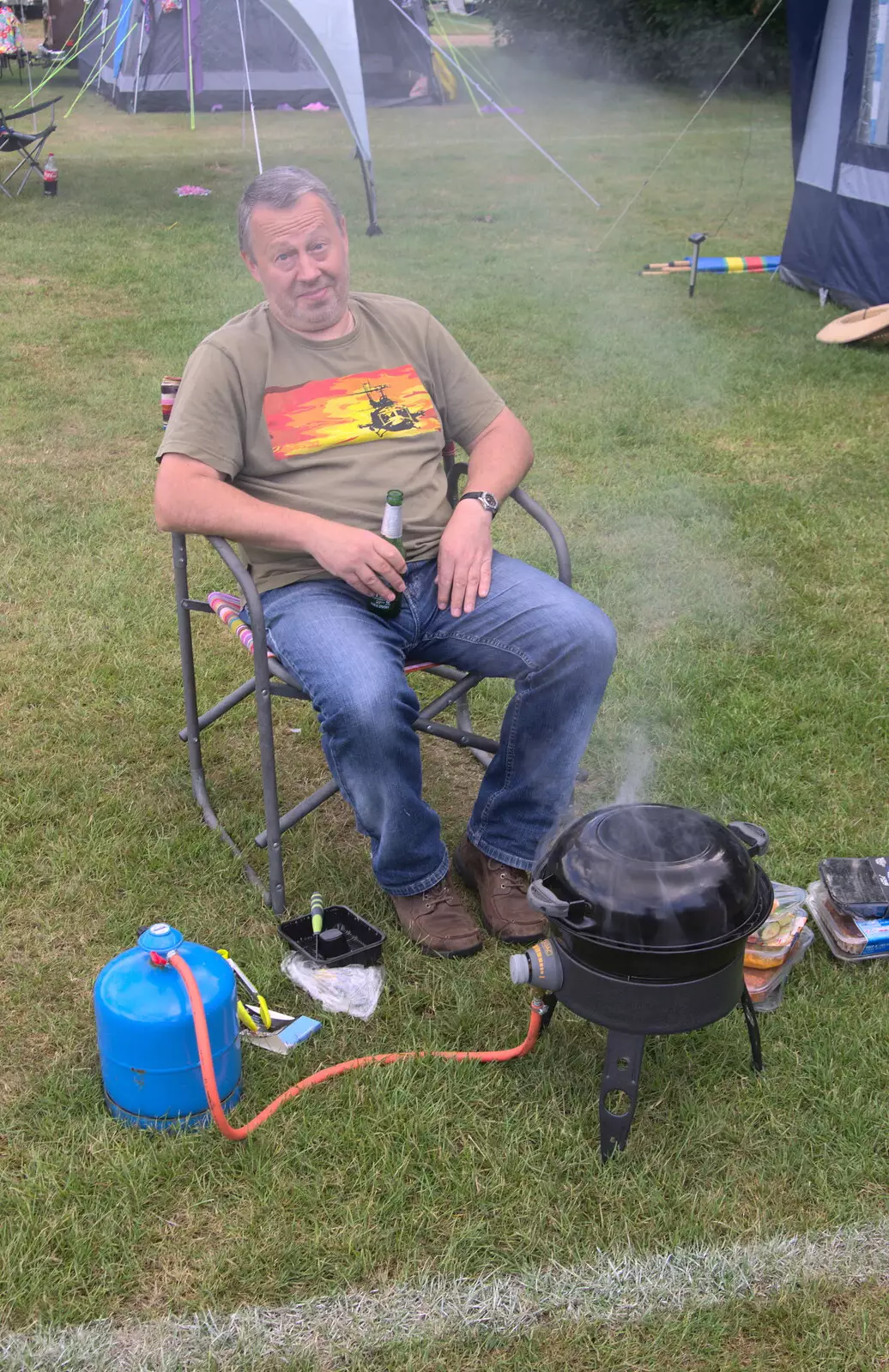 Chris looks happy with his lot, from Camping at Dower House, West Harling, Norfolk - 1st July 2017