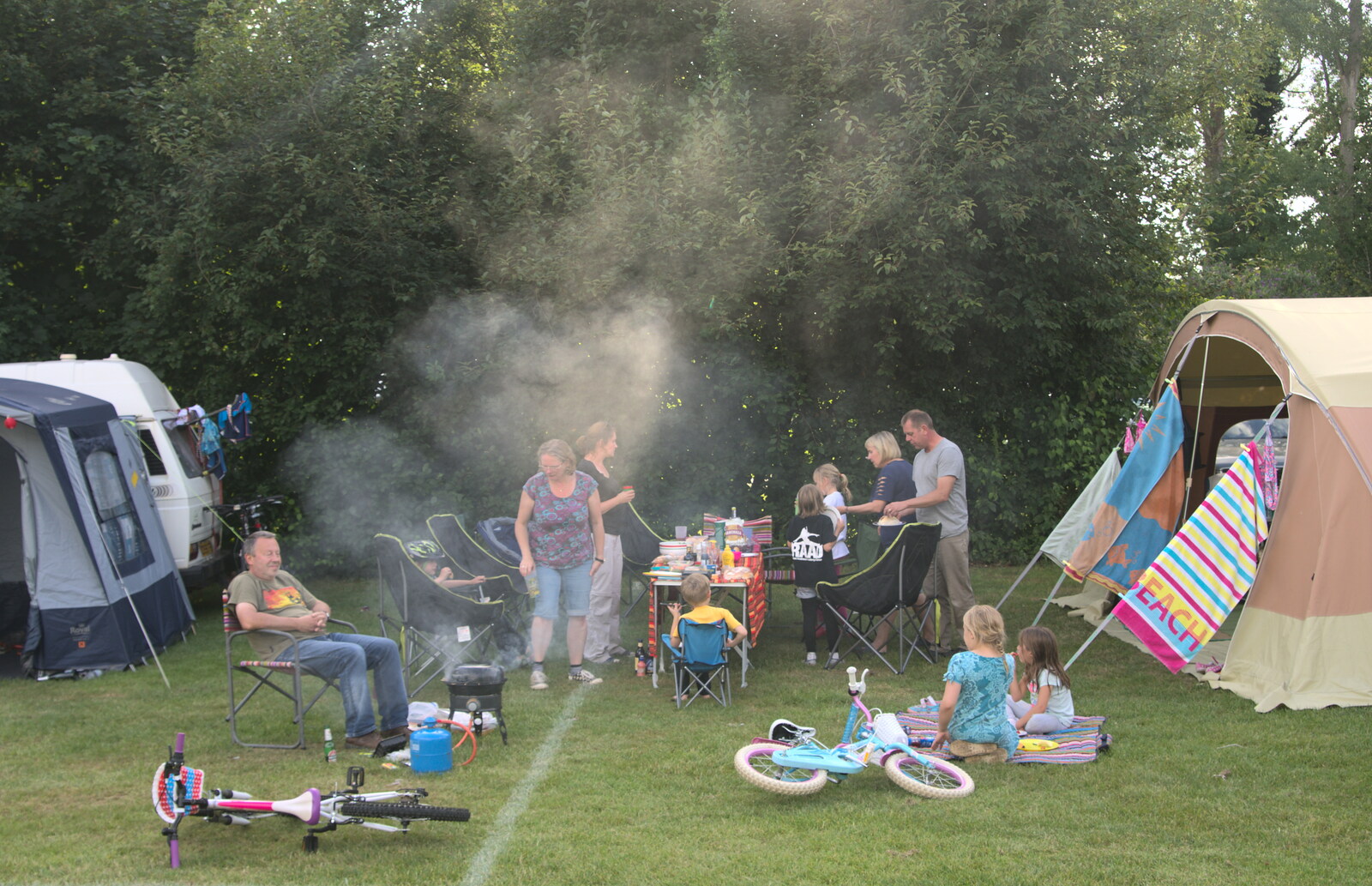 There's a lot of smoke coming from a barbeque from Camping at Dower House, West Harling, Norfolk - 1st July 2017