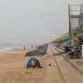 Brave beach-goers brave the rain under umbrellas, A Wet Day at the Beach, Sea Palling, Norfolk - 16th July 2017