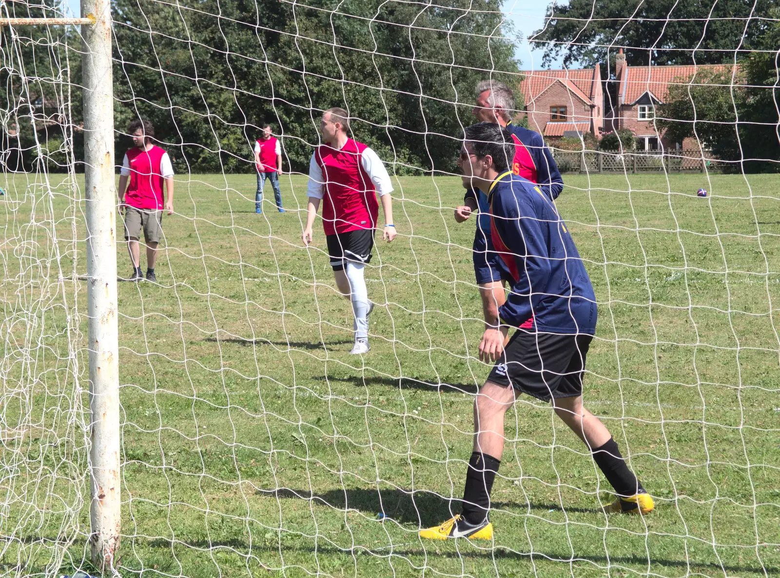 A charity footbal match occurs nearby, from The Humpty Dumpty Beer Festival, Reedham, Norfolk - 22nd July 2017