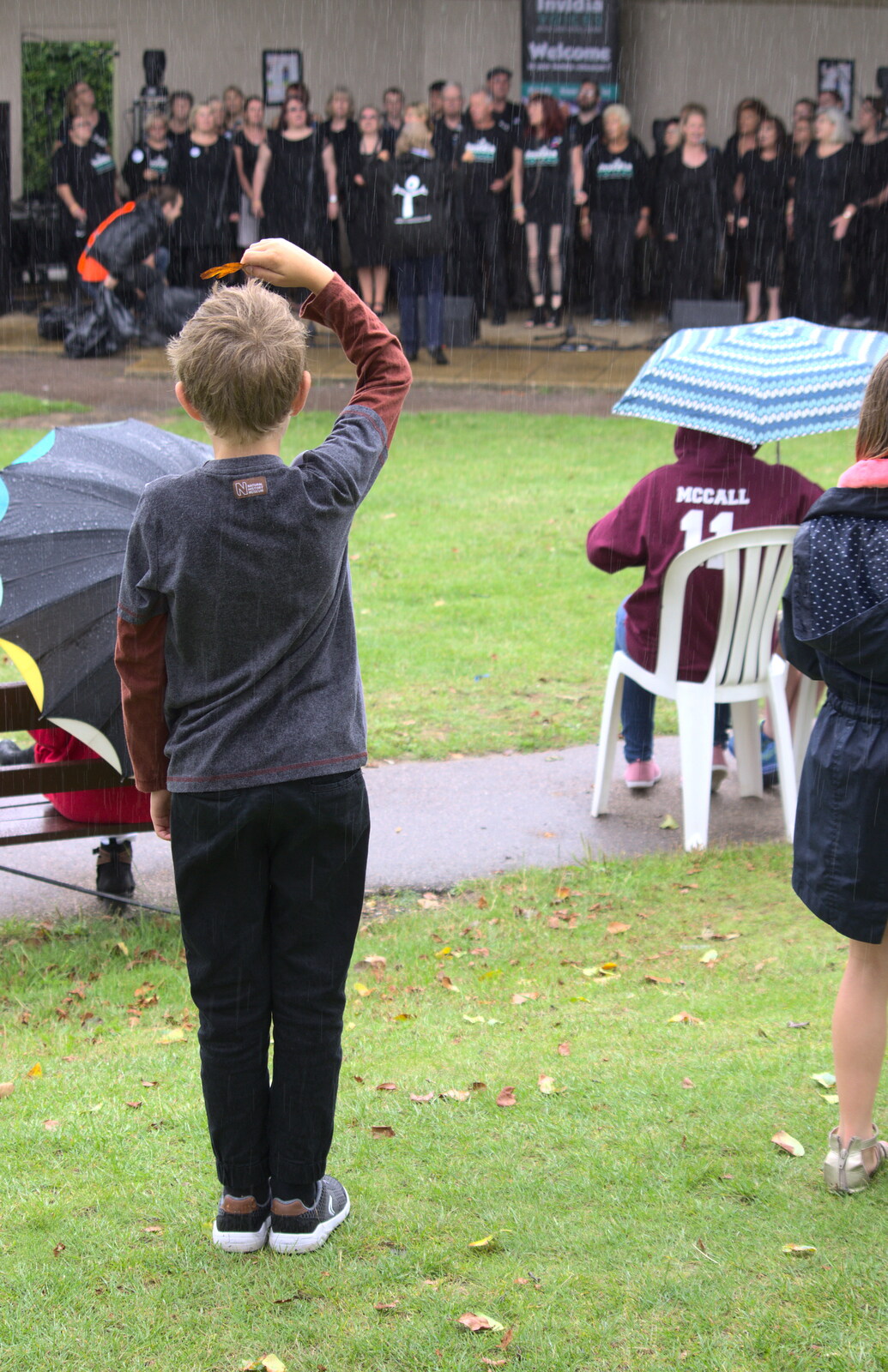 Fred makes an umbrella out of a leaf from Diss Fest, or Singin' in the Rain, Diss, Norfolk - 23rd July 2017